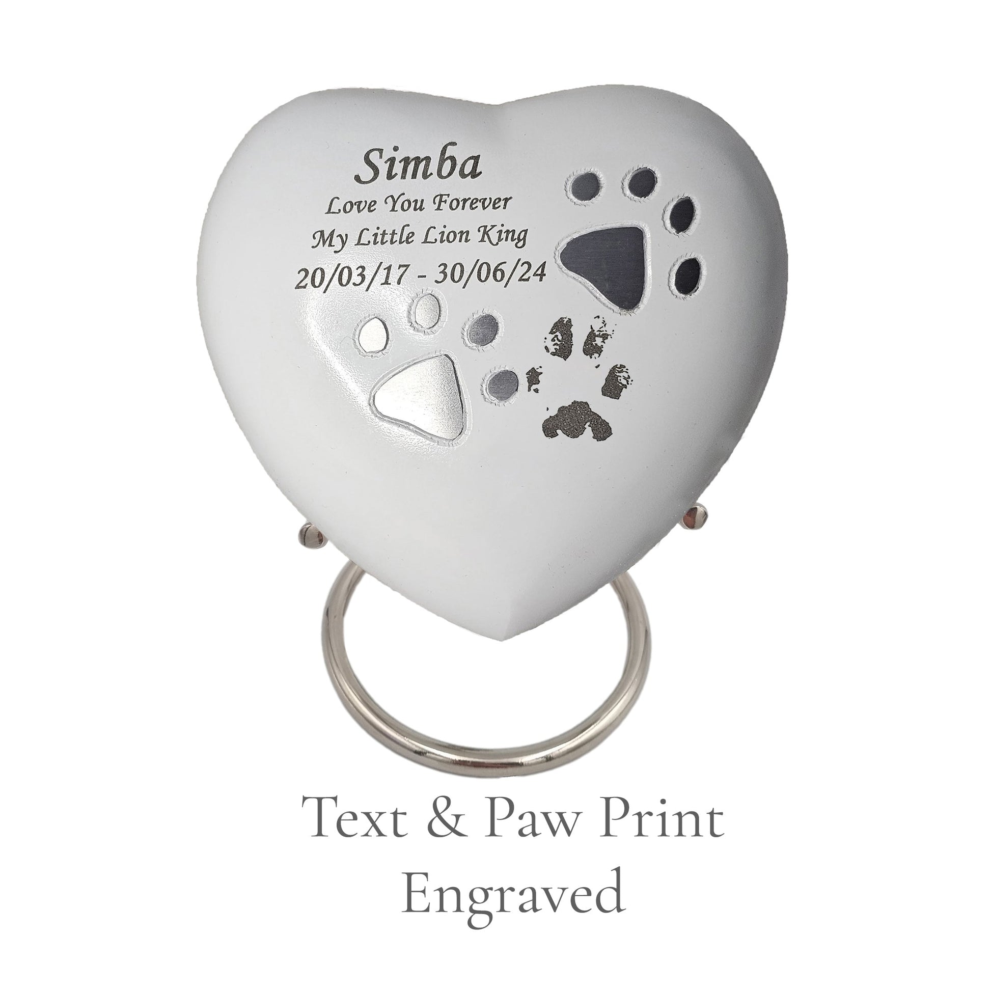 text and paw print engraved on urn